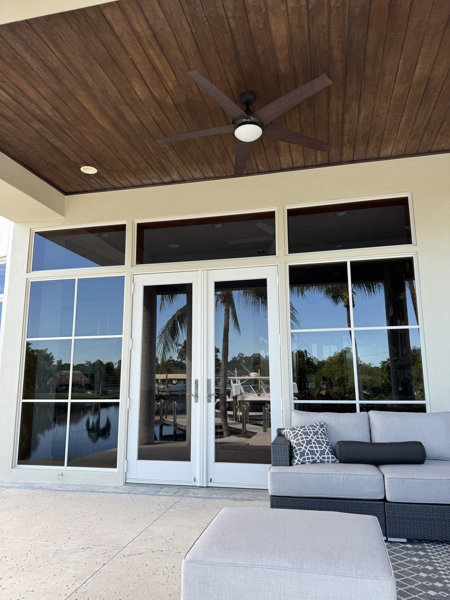 Freshly cleaned lanai glass doors and windows on a Fort Myers waterfront home